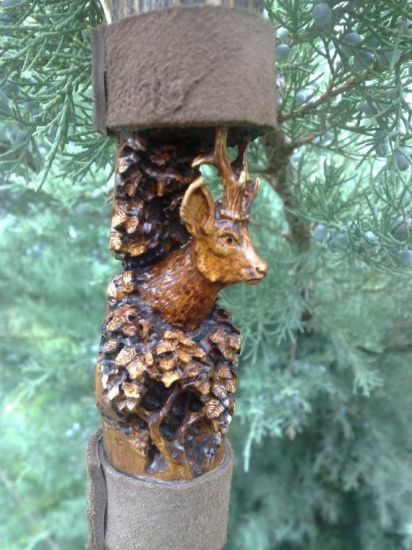 ,zdobená lôovecká palica,