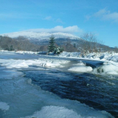 Vltava,v pozadí bázum