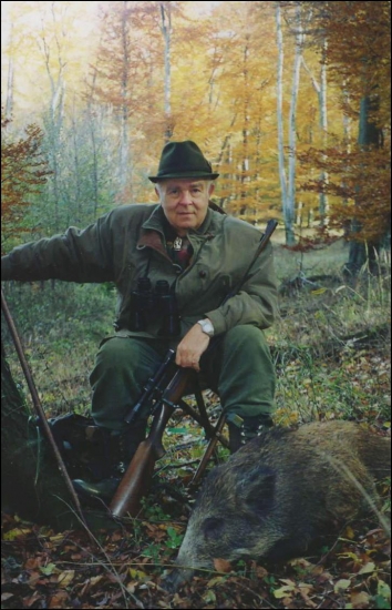 Spokojnosť po úspešnej poľovačke/otec/