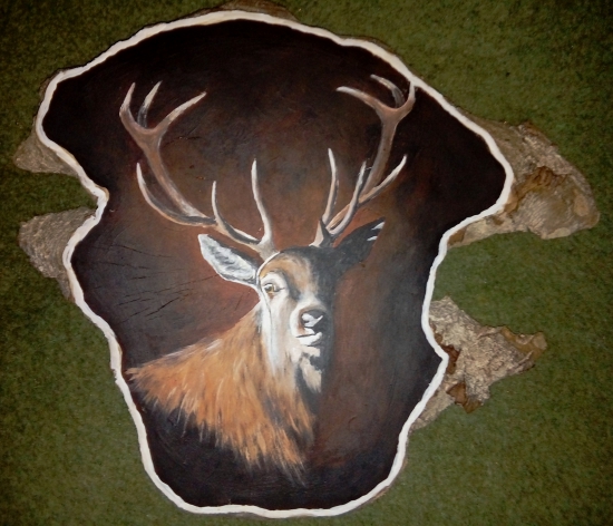 Jeleň na doske