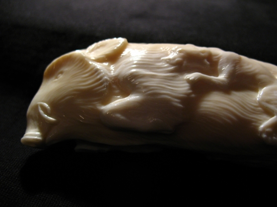 Lovecké scény. Rukojeť nože.