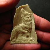A howling wolf (mammoth tusk)