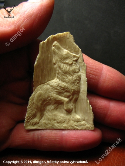 A howling wolf (mammoth tusk)