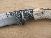 Detail gravirovaneho noža