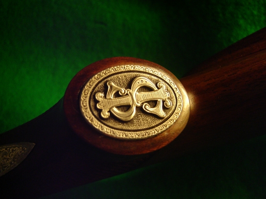 strieborný medajlon na pažbu...