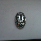 strieborný medajlon do pistolovej rukovete pažby, s monogramom RP....