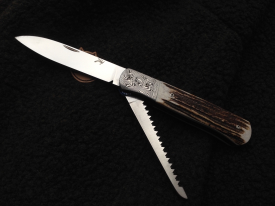 Vreckový nôž s pílkou