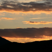 Západ slunce s Milešovkou