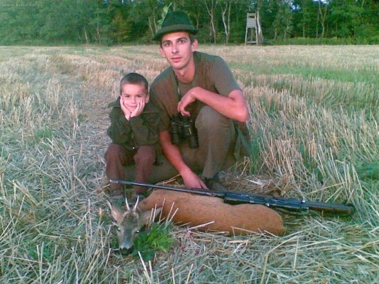 strelec a maly pomocník